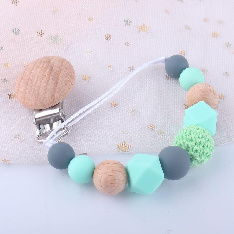 Support en bois moderne fait main pour attaches-sucettes, sangle de laisse, support de tétine pour l'alimentation de bébé
