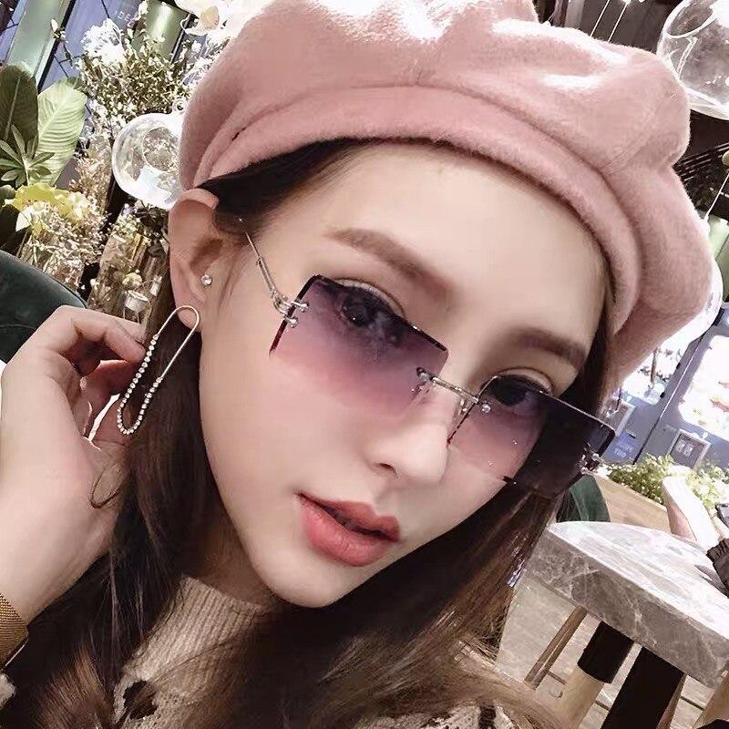 Lunettes de soleil tendance pour femmes sans monture, petits verres rectangulaires, monture en métal de haute qualité et protection UV400