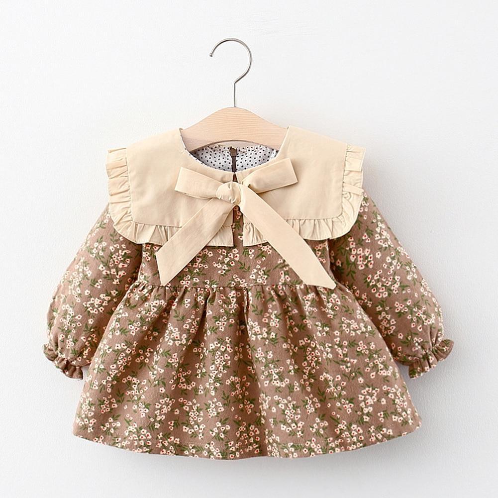 Robe de fille rétro moderne pour l'hiver, robe de nouveau-né, robe de soirée en coton à nœud floral mignon pour bébé