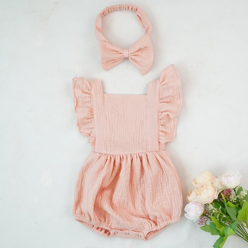 Grenouillères pour nouveau-nés Vêtements de bébé Barboteuse d'été en coton Combinaison une pièce Douce et élégante de style moderne