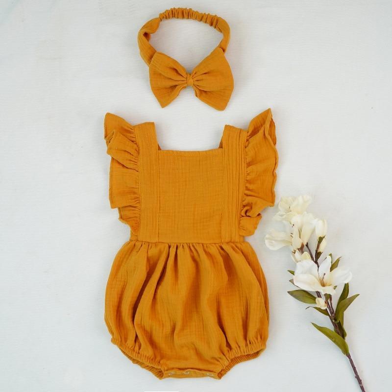 Grenouillères pour nouveau-nés Vêtements de bébé Barboteuse d'été en coton Combinaison une pièce Douce et élégante de style moderne