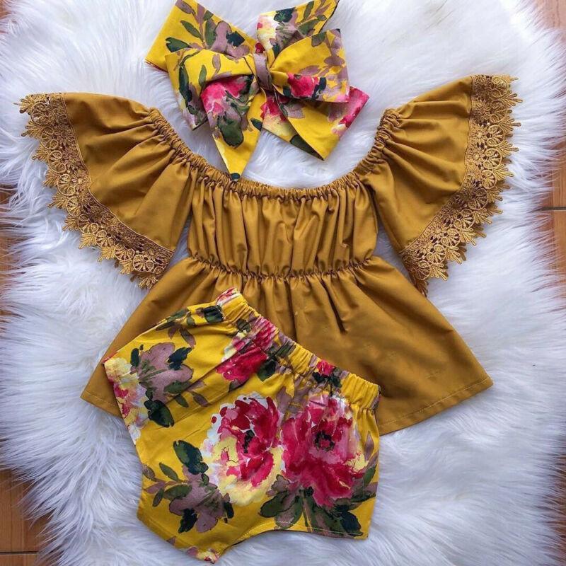 Tenues élégantes de luxe fleuries pour bébés filles nouveau-nés et tout-petits, comprenant un haut solide à épaules dénudées, un short fleuri et un bandeau avec nœud.