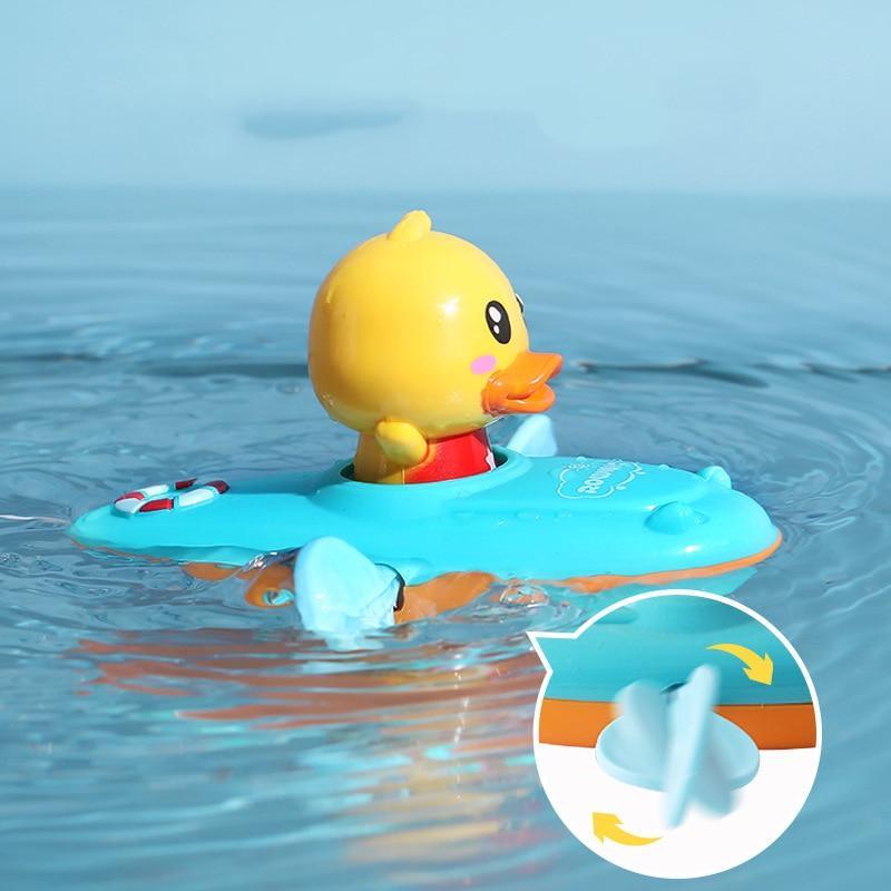 Jouets de bain pour bébé dessin animé, jouet d'eau classique en forme de canard à tirer pour bébé, jouet de bain pour l'éducation précoce du nourrisson, jouet de natation de plage pour enfants.