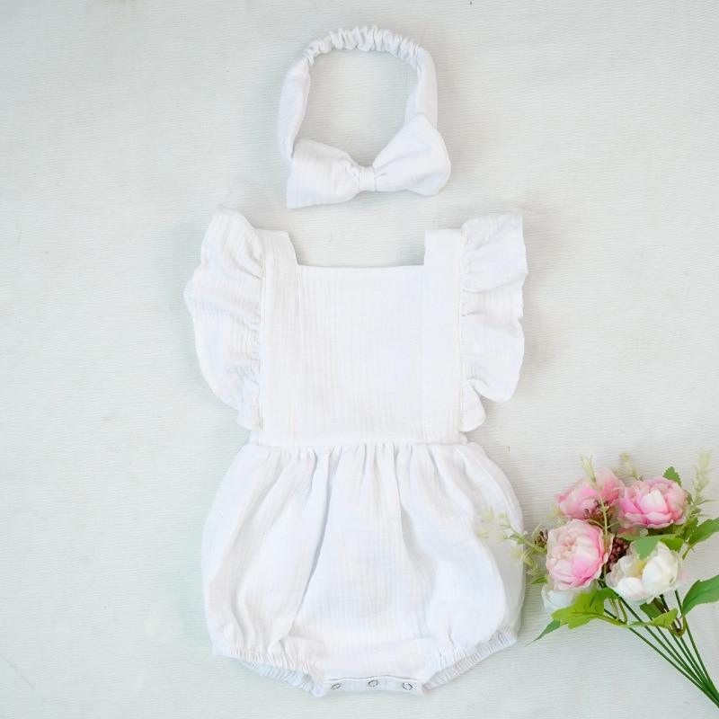 Grenouillères pour nouveau-nés Vêtements de bébé Barboteuse d'été en coton Combinaison une pièce Douce et élégante de style moderne