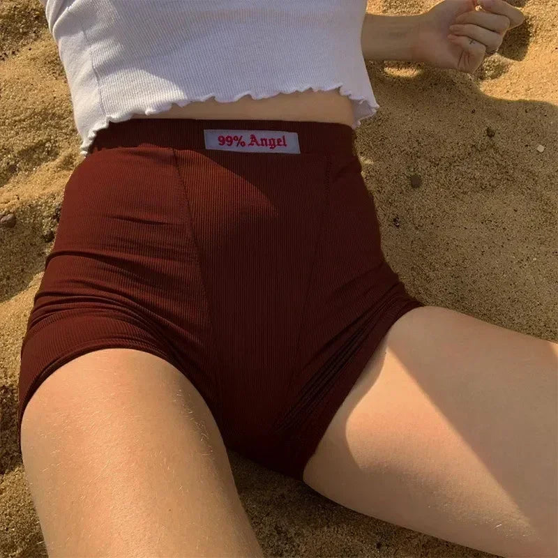 Shorts motard en maille côtelée noire à taille haute et broderie lettre blanche pour femme