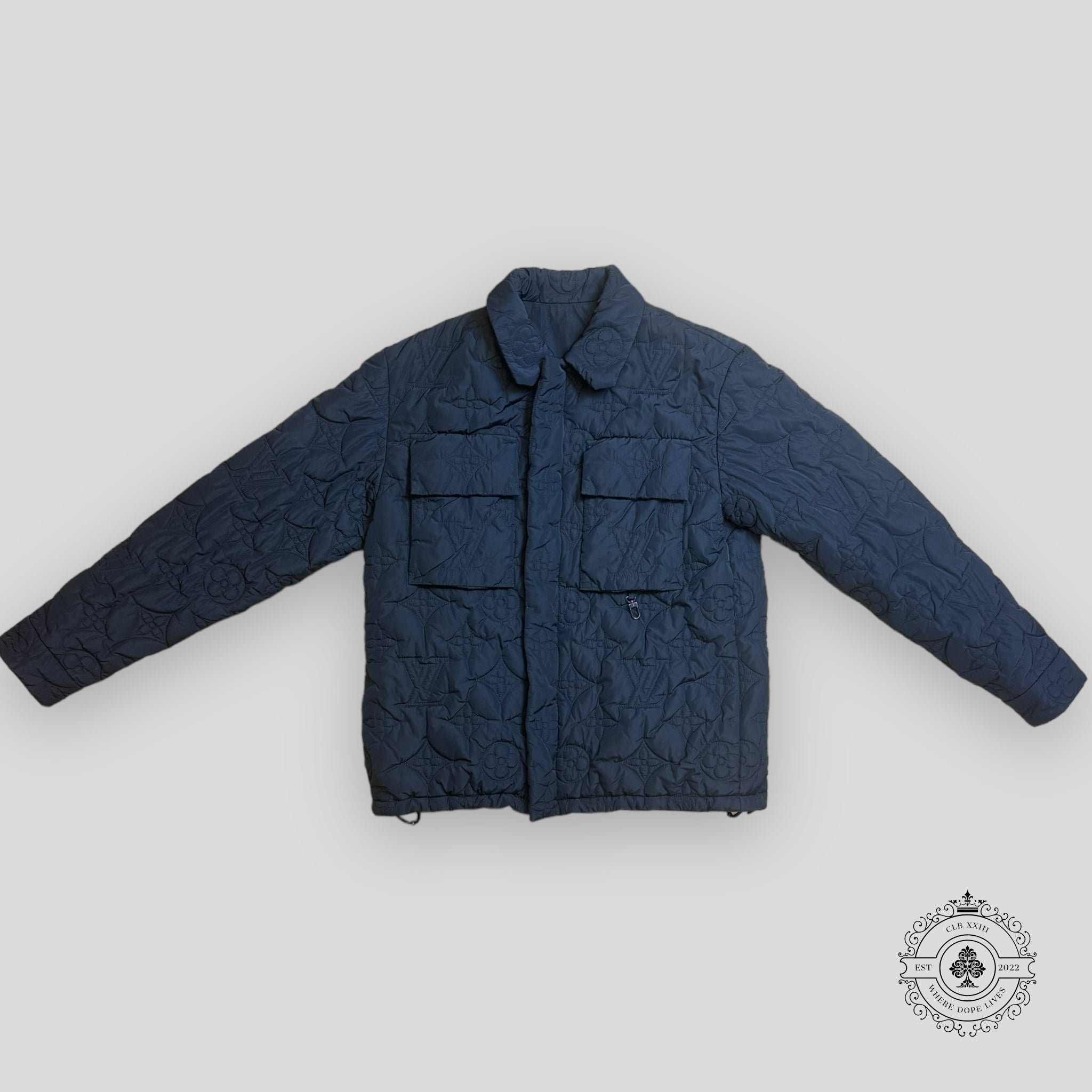 Doudoune Louis Vuitton Monogram embossé matelassée bleu marine