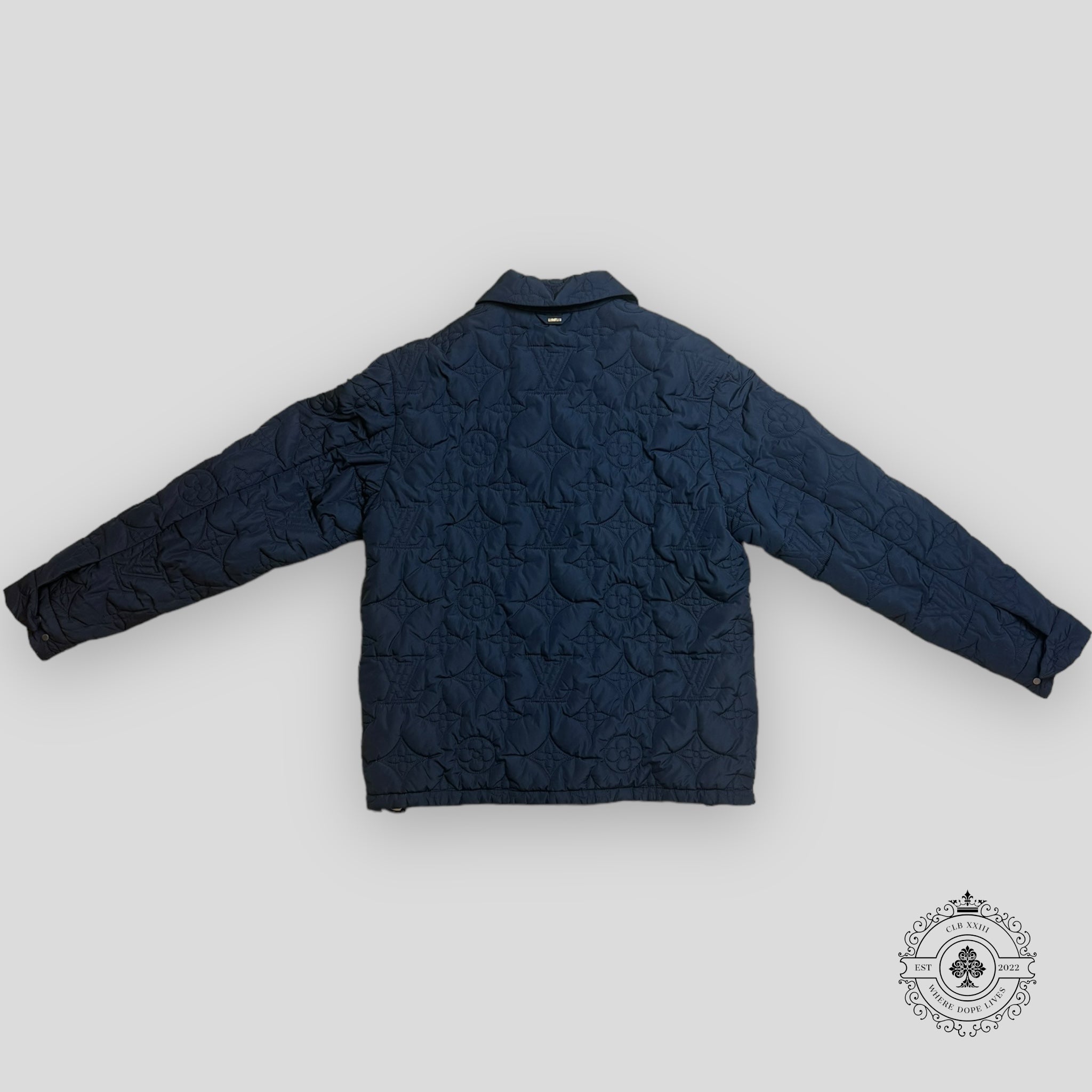 Doudoune Louis Vuitton Monogram embossé matelassée bleu marine