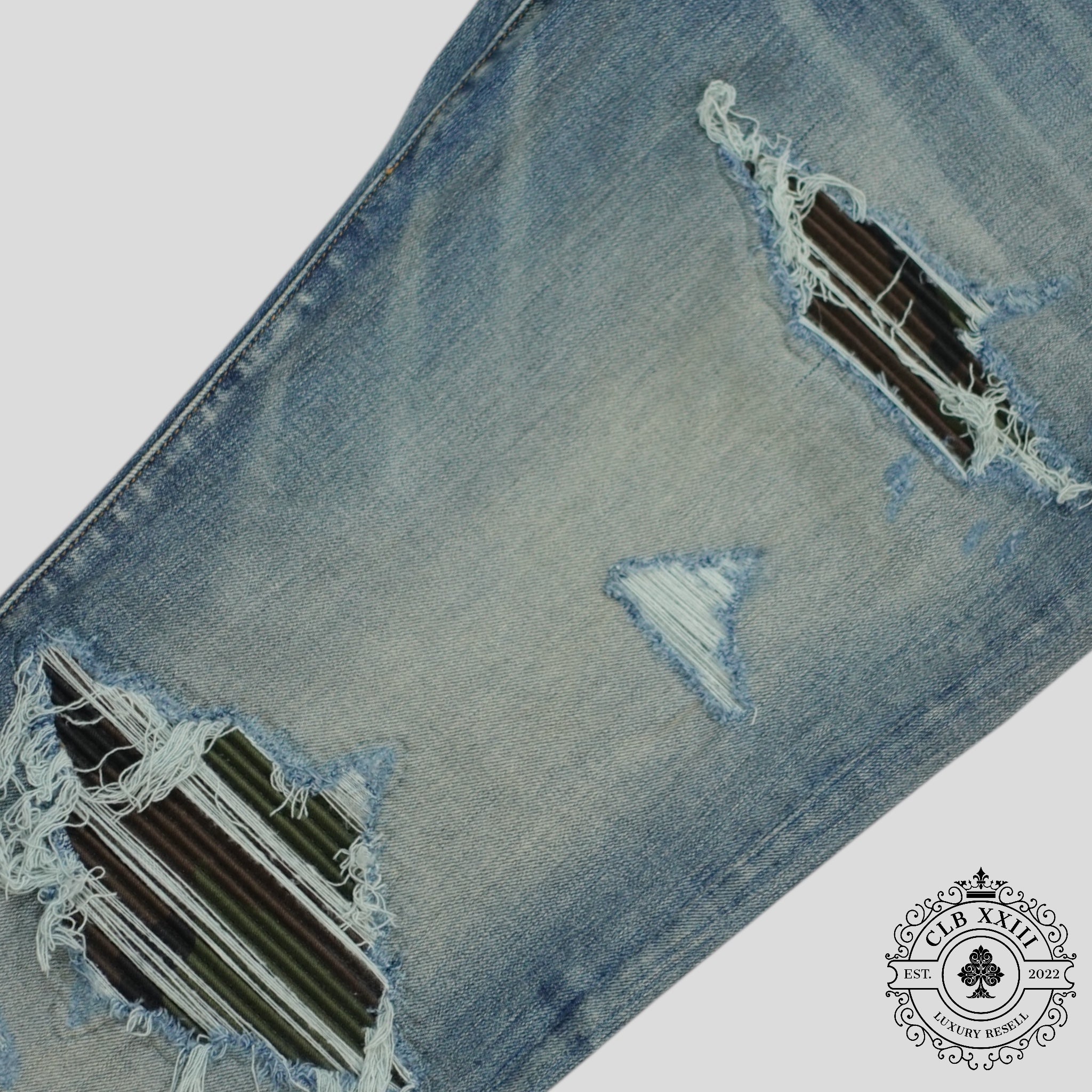 Jeans Amiri MX1 Camo Patch en indigo argileux
