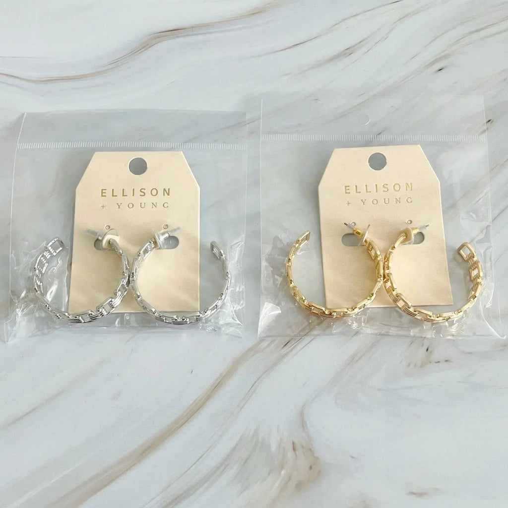 Boucles d'oreilles créoles dorées entrelacées