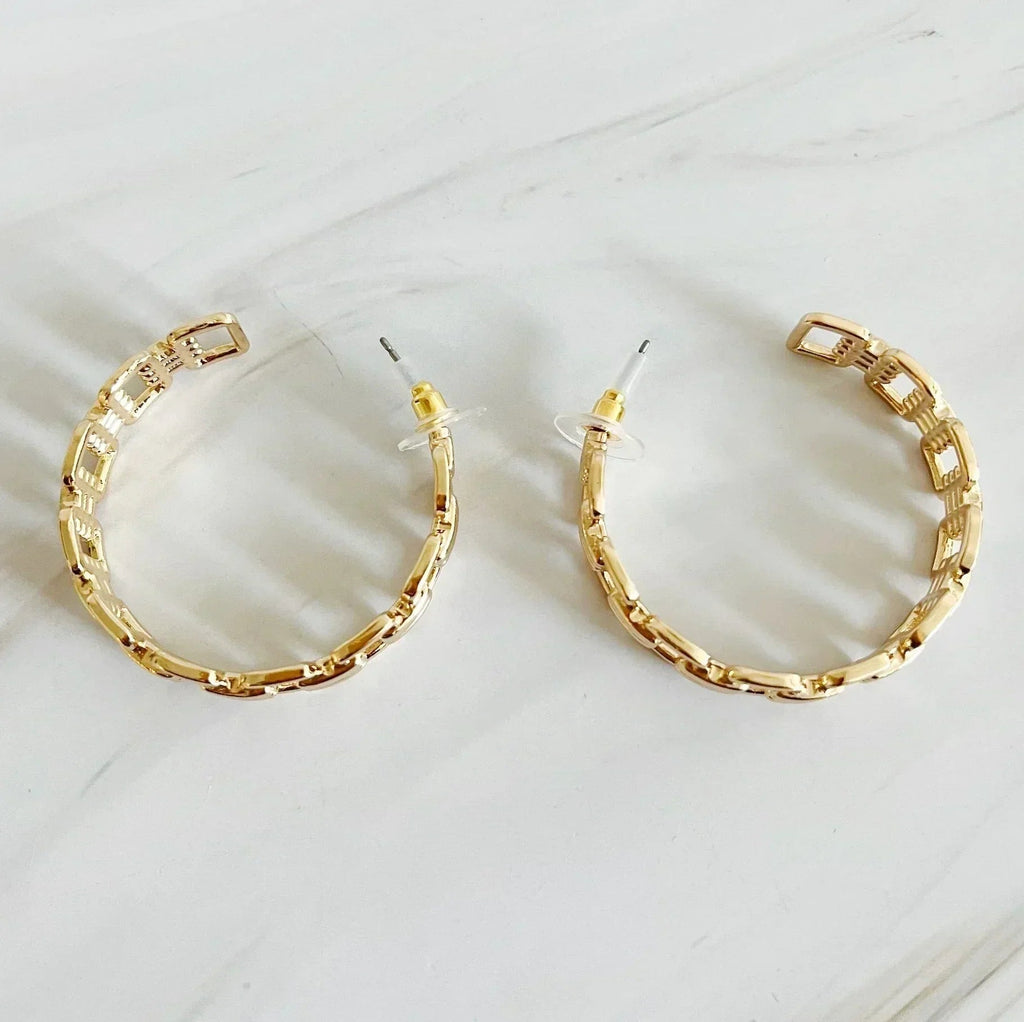 Boucles d'oreilles créoles dorées entrelacées