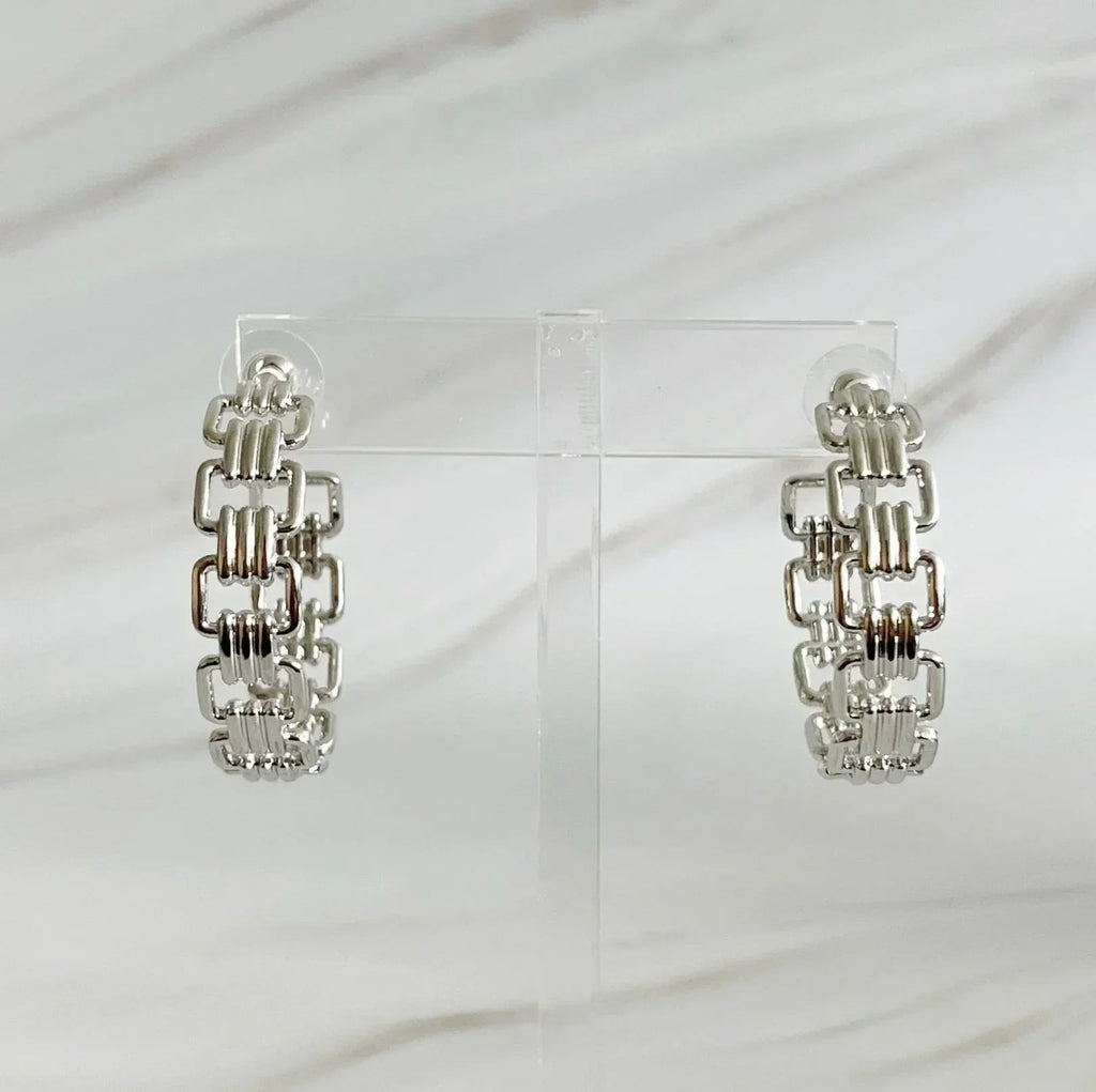 Boucles d'oreilles créoles dorées entrelacées