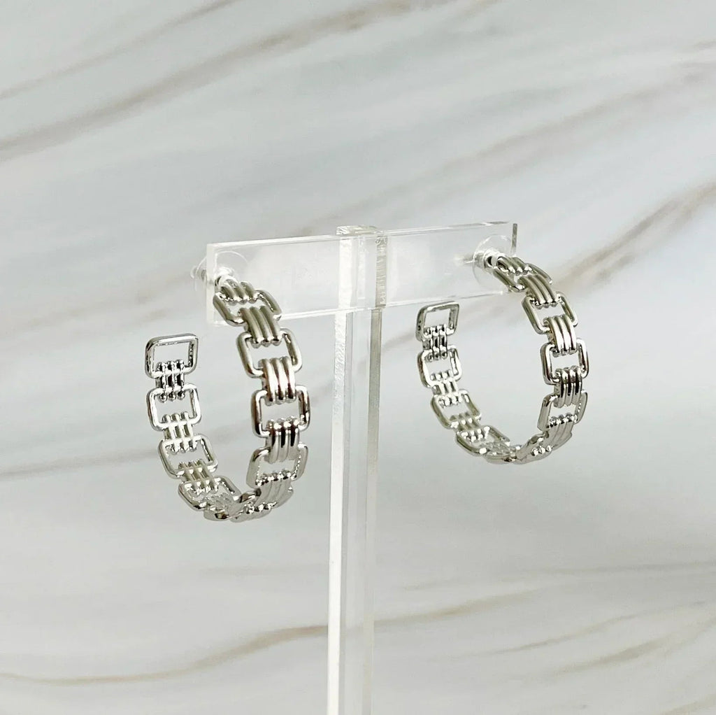 Boucles d'oreilles créoles dorées entrelacées