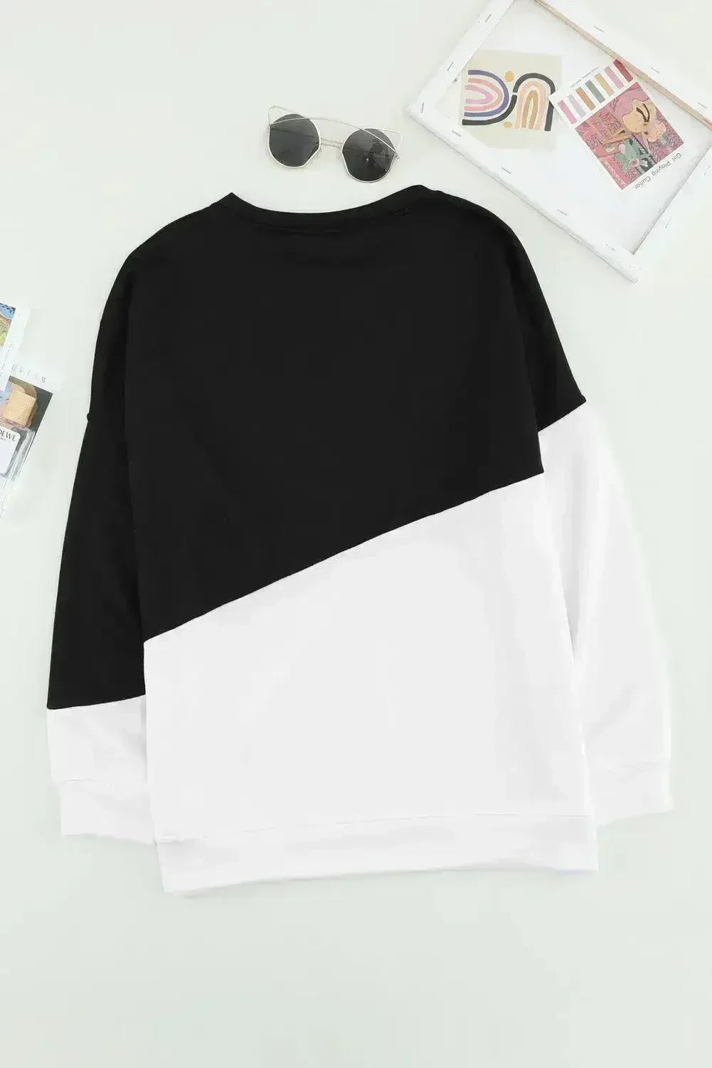 Sweat-shirt patchwork noir et blanc à épaules tombantes