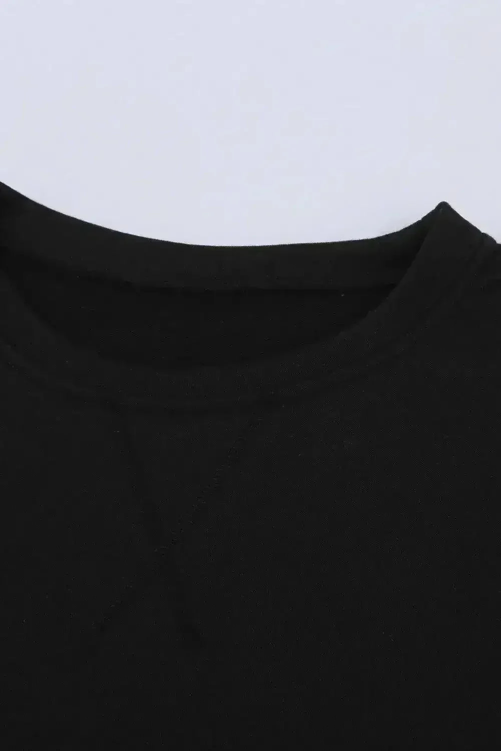 Sweat-shirt patchwork noir et blanc à épaules tombantes