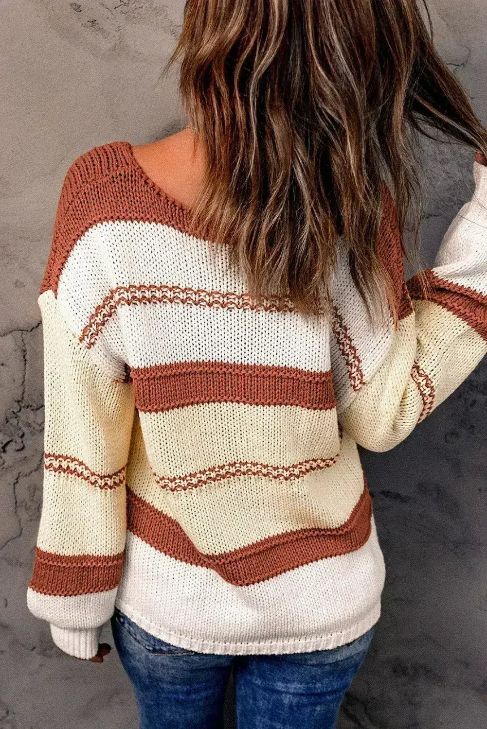 Pull rayé rouge et beige