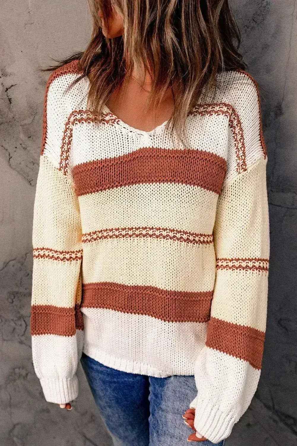 Pull rayé rouge et beige