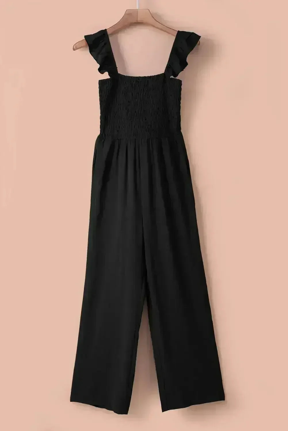 Combinaison-pantalon noire chic à jambes larges