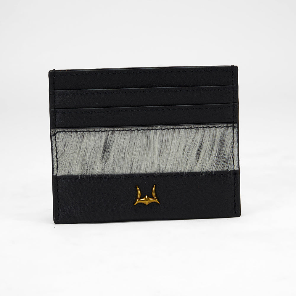 Loyal West PORTE-CARTES SHELL EN PEAU DE VACHE NOIRE ET BLANCHE