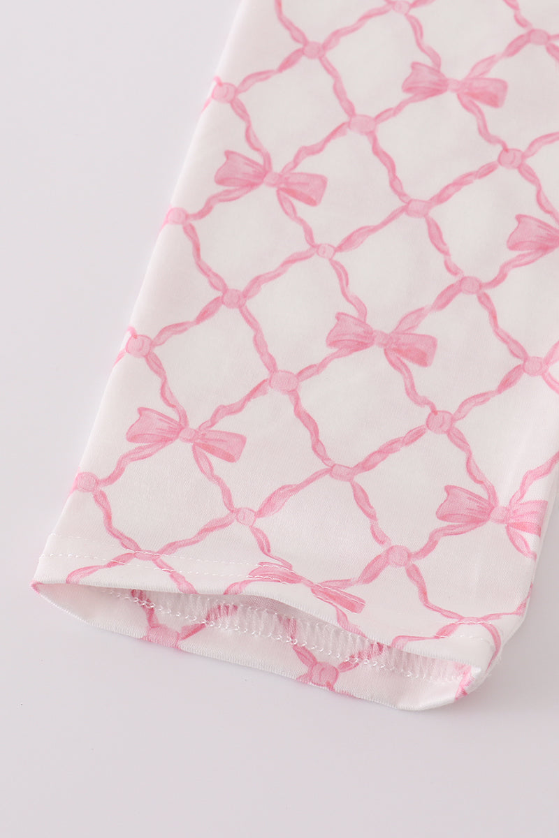 Ensemble pantalon smocké avec nœud rose