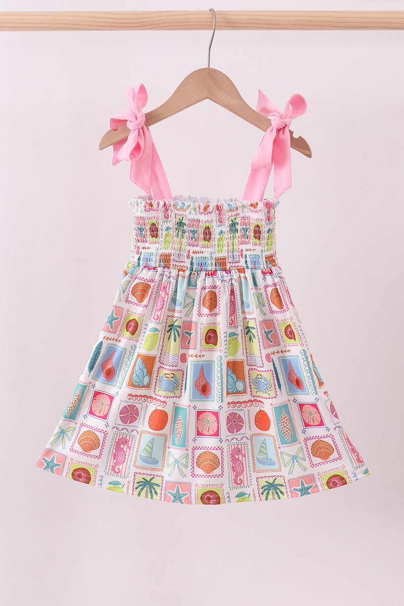Robe smockée mère-enfant rose pour la plage