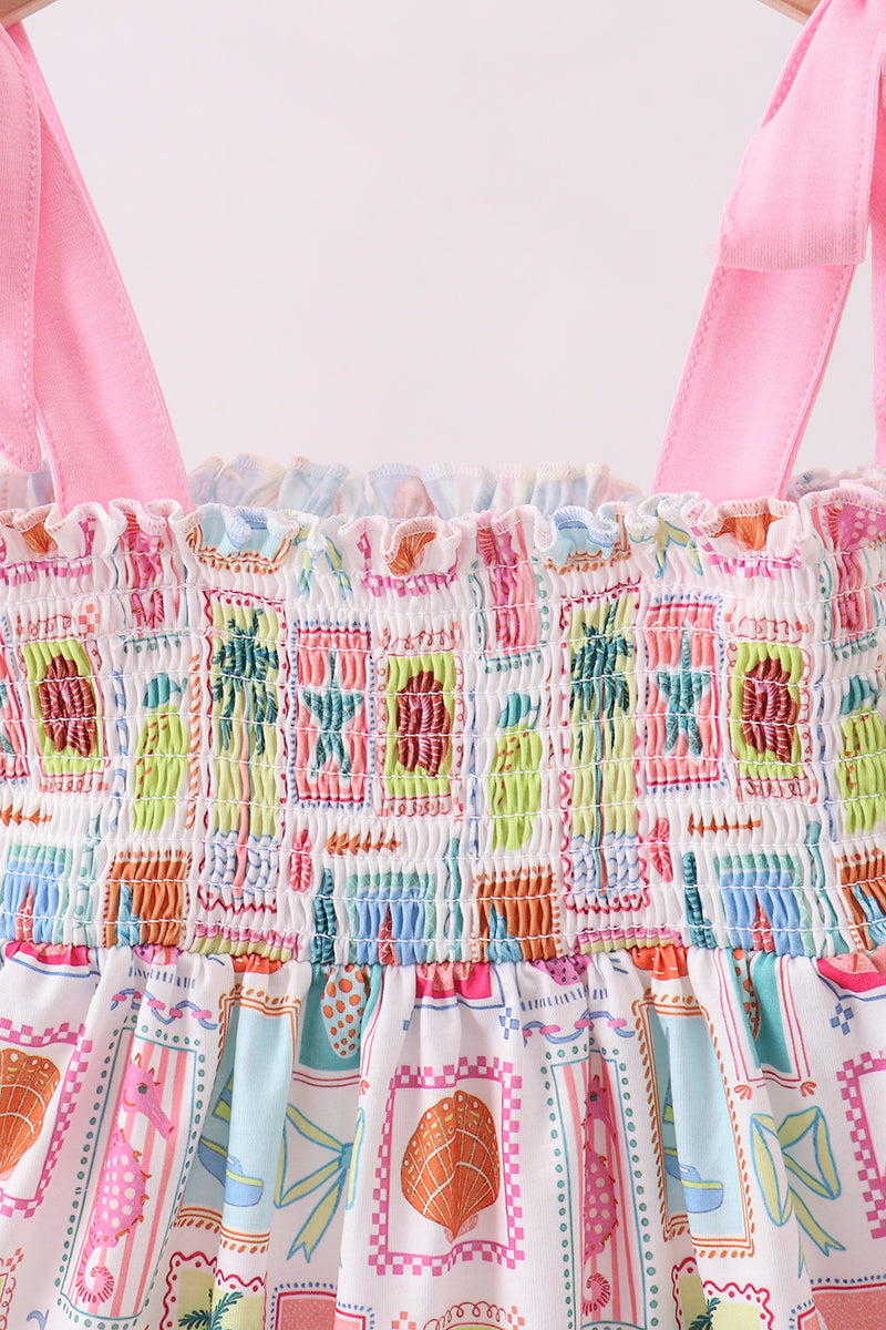 Robe smockée mère-enfant rose pour la plage