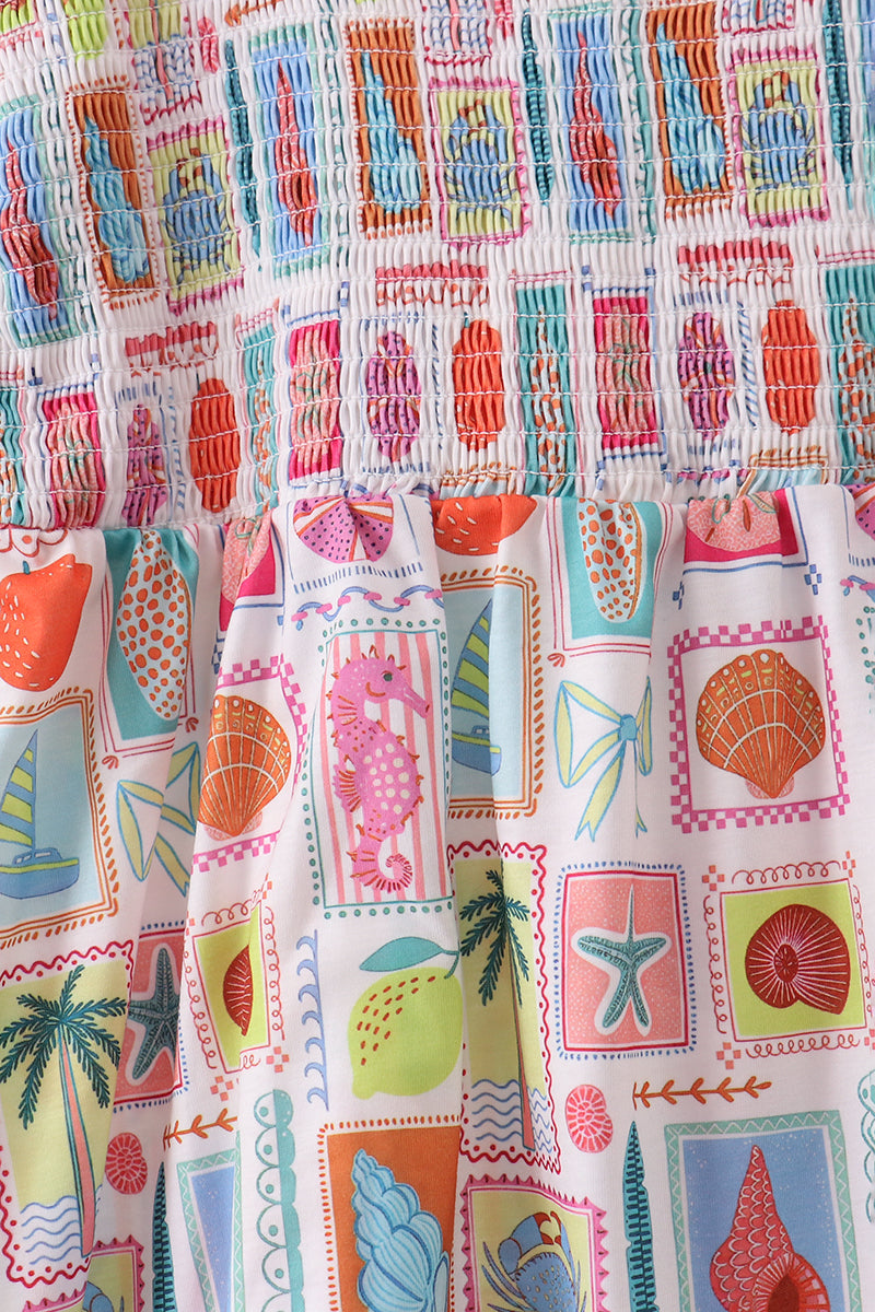 Robe smockée mère-enfant rose pour la plage