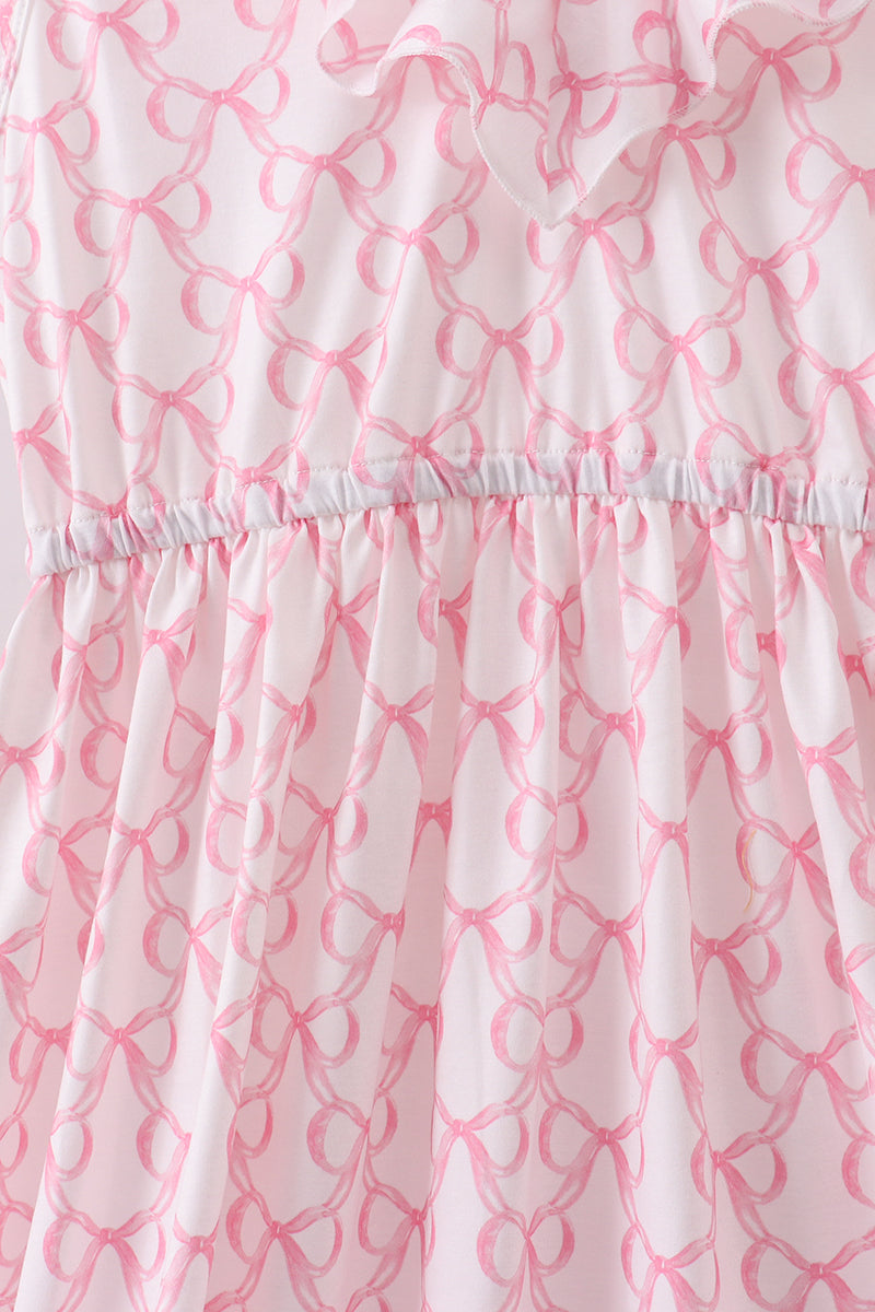 Robe rose à volants étagée et à nœud papillon