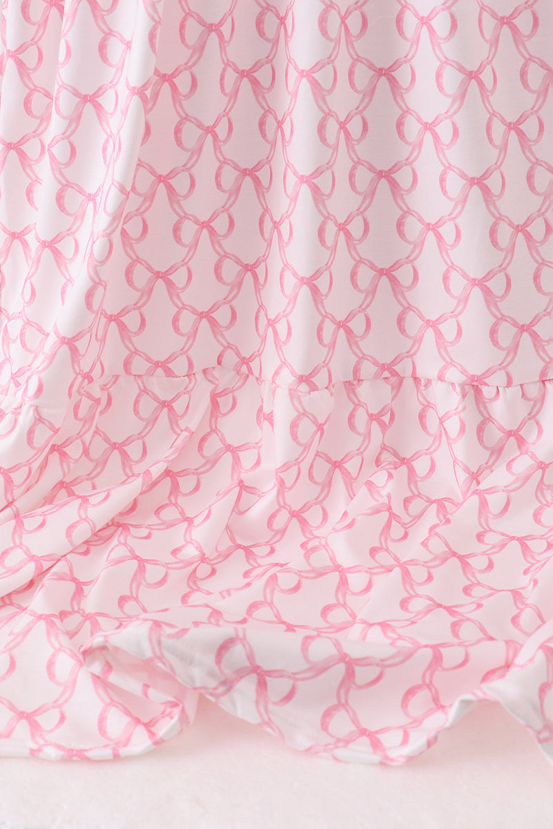 Robe rose à volants étagée et à nœud papillon