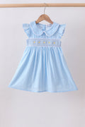Robe à volants jacquard smockée fleurie bleue
