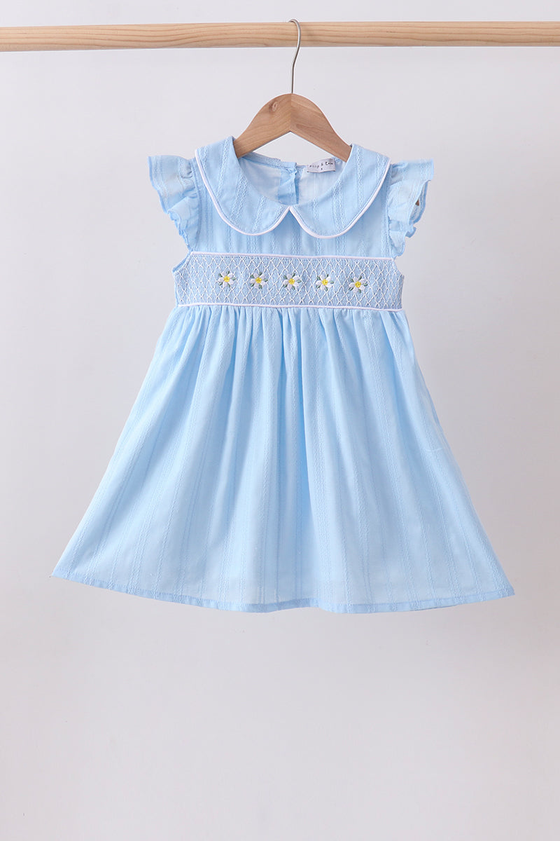 Robe à volants jacquard smockée fleurie bleue