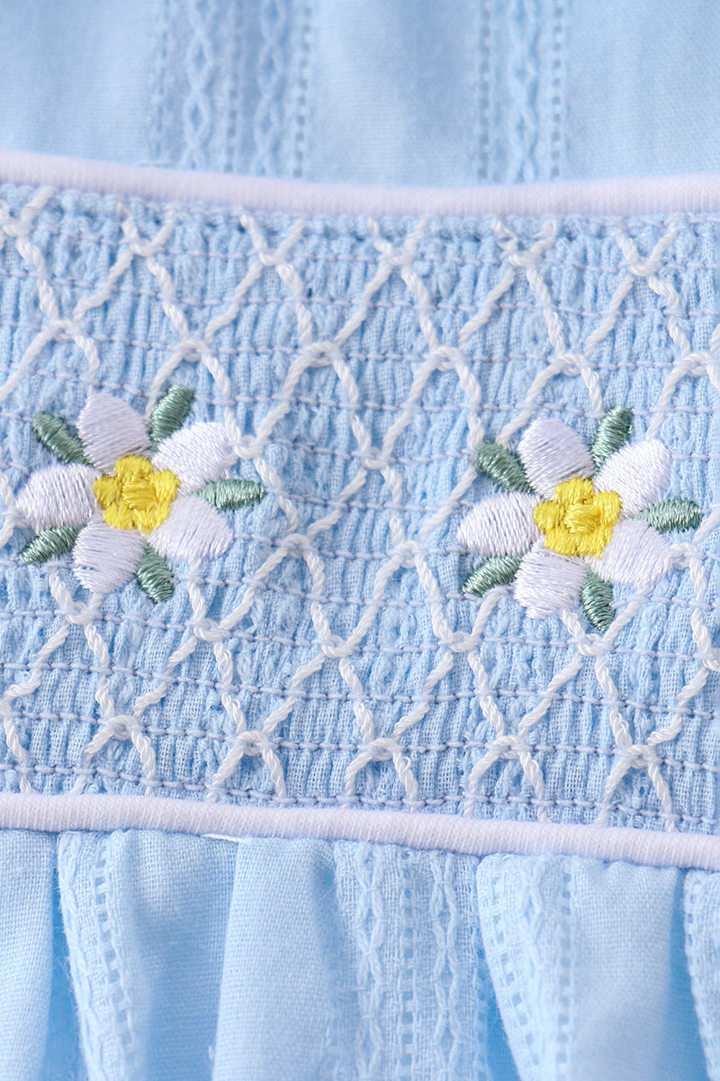 Robe à volants jacquard smockée fleurie bleue