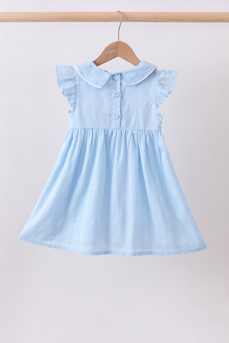 Robe à volants jacquard smockée fleurie bleue