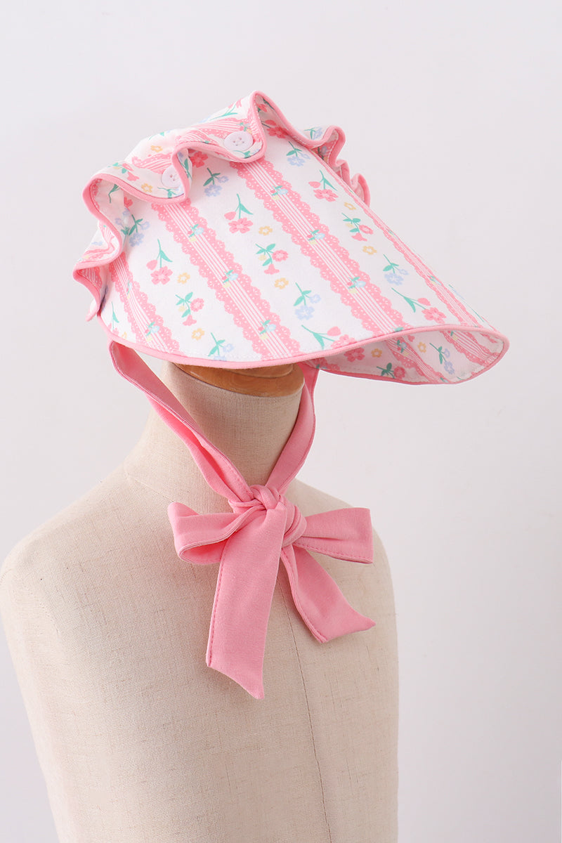 Bonnet à volants et nœud, imprimé floral rose poudré