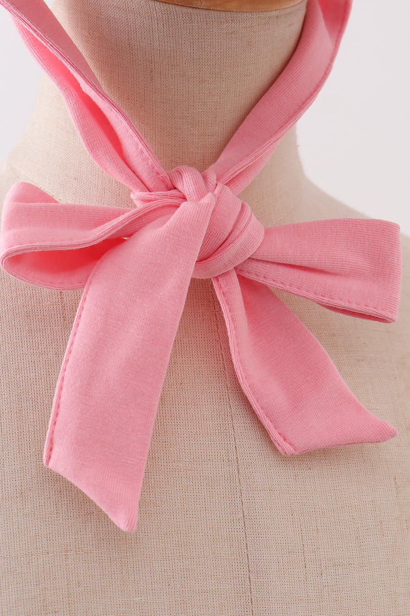 Bonnet à volants et nœud, imprimé floral rose poudré