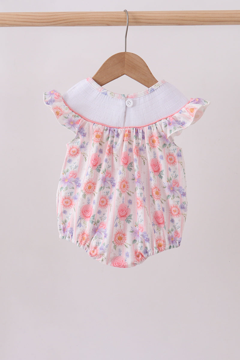 Barboteuse smockée à volants et nœud, motif roses violettes