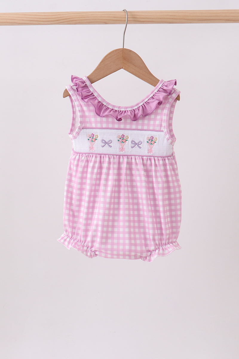 Barboteuse à smocks à volants rose fleuri avec nœud
