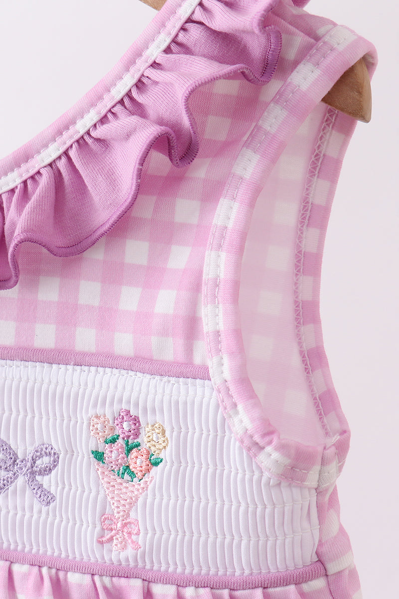 Barboteuse à smocks à volants rose fleuri avec nœud
