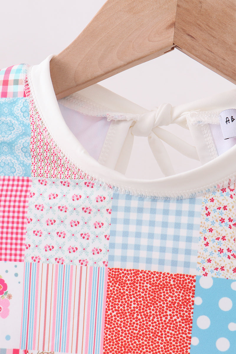 Haut de protection anti-UV à volants, motif patchwork floral rose