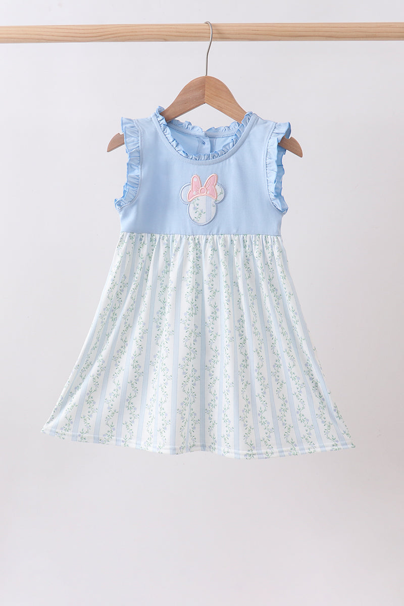 Robe à volants avec applique personnage bleu