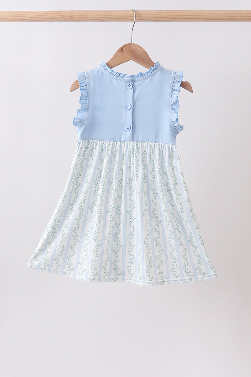 Robe à volants avec applique personnage bleu