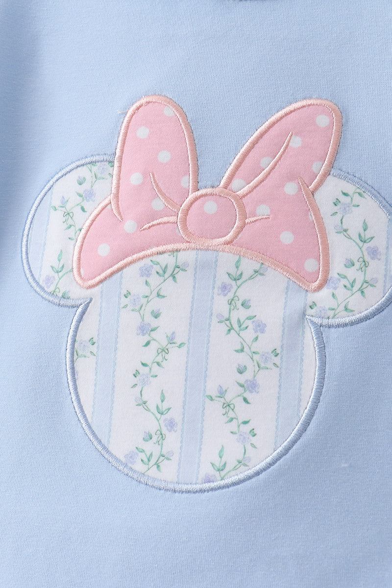 Robe à volants avec applique personnage bleu