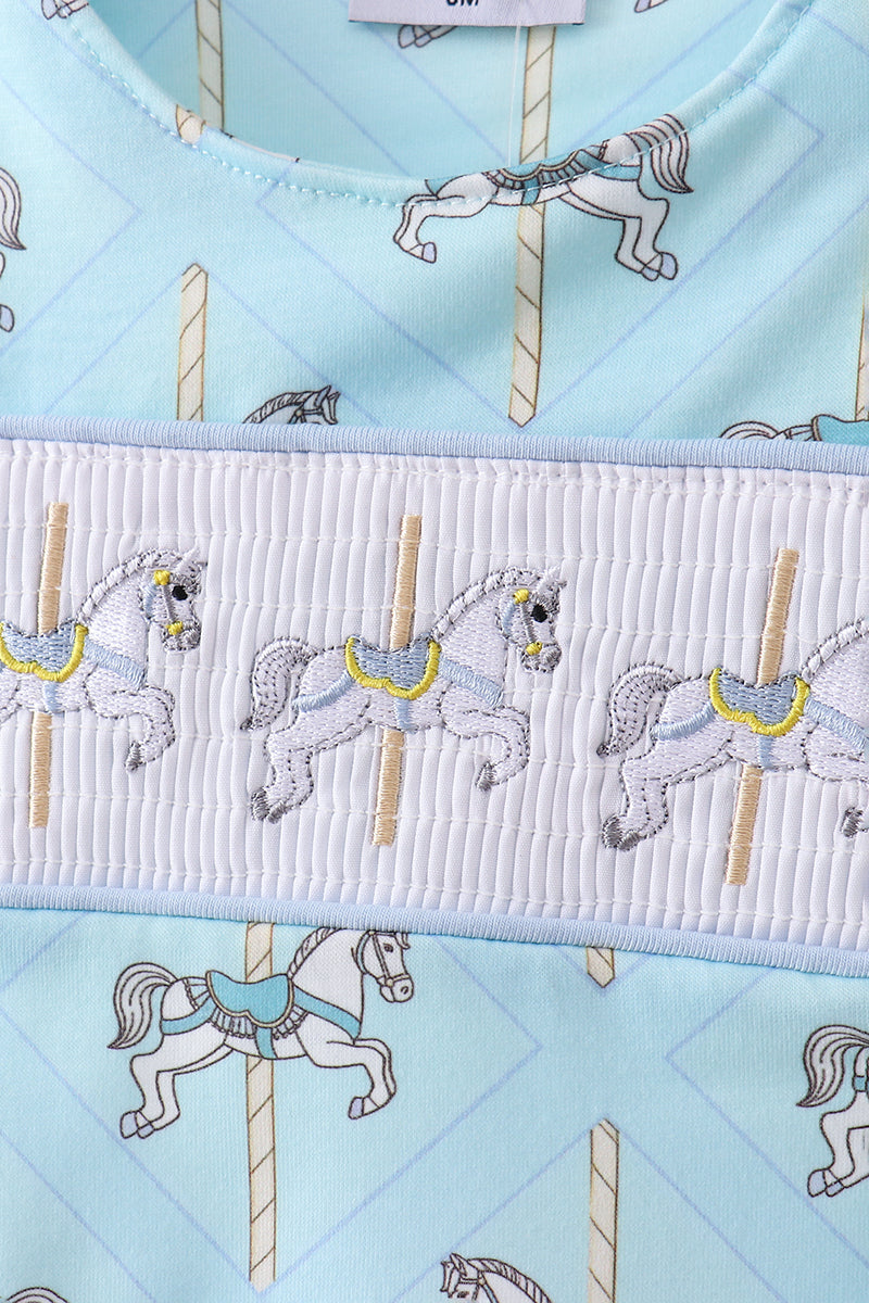 Barboteuse smockée carrousel bleue