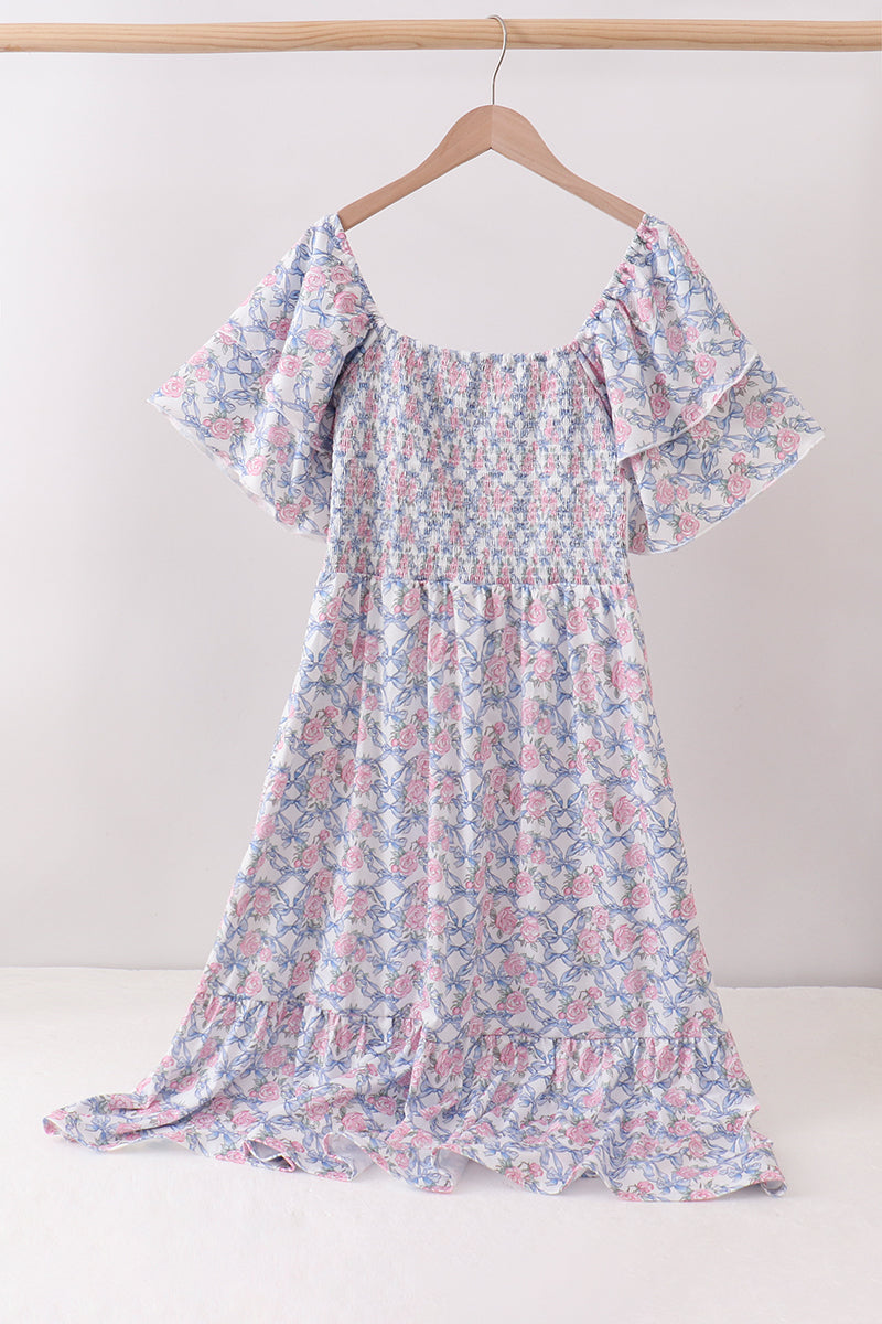 Robe smockée fleurie bleue pour femme