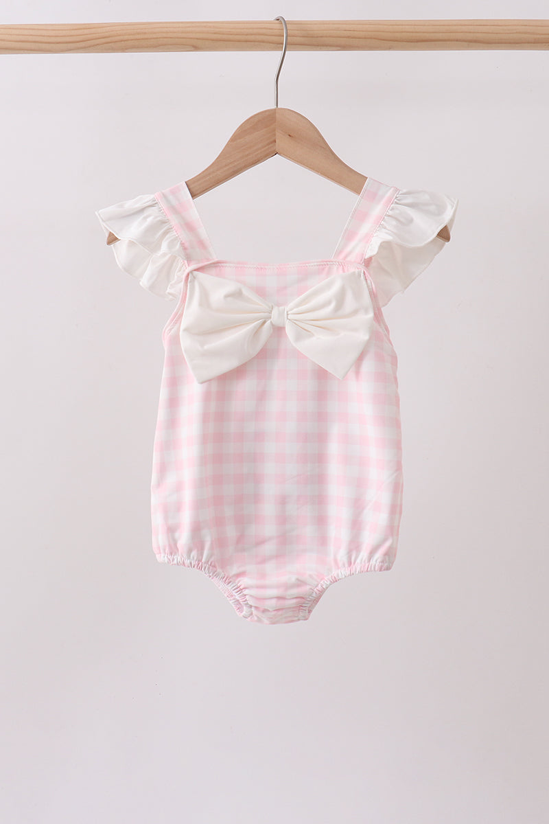 Maillot de bain une pièce rose à carreaux et nœud avec protection UV