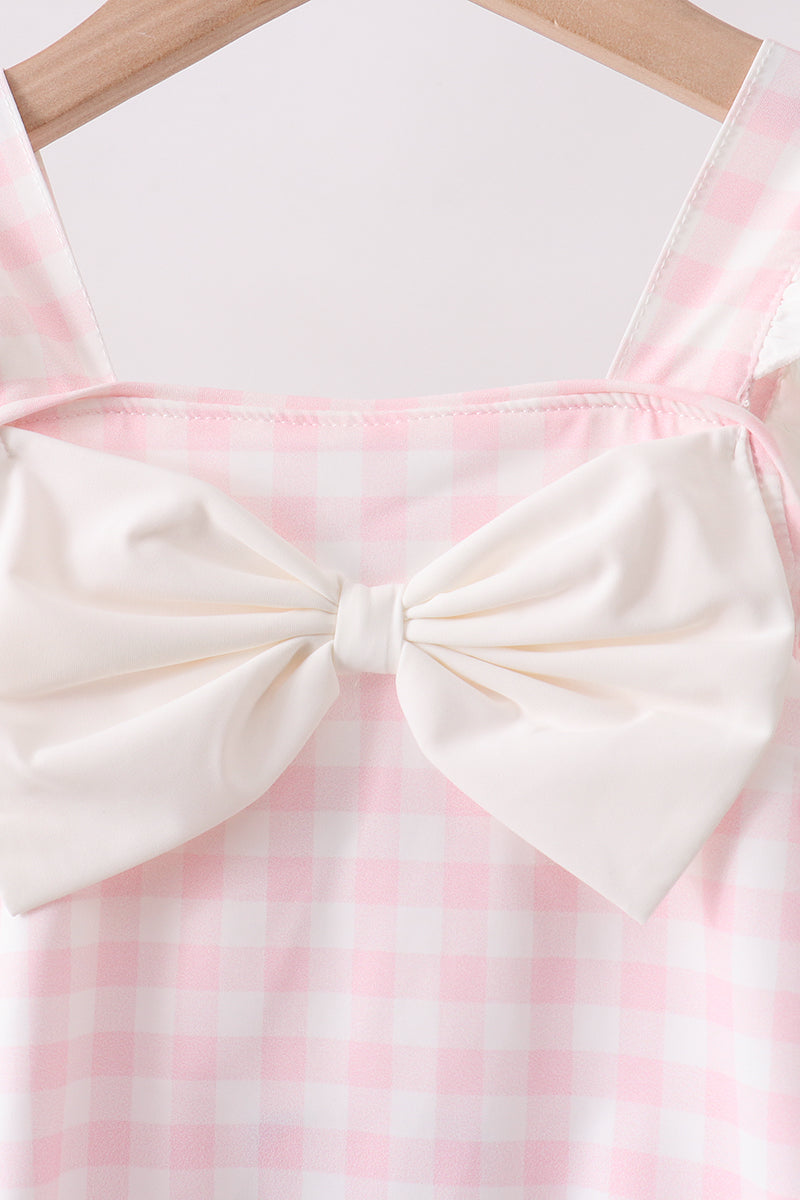 Maillot de bain une pièce rose à carreaux et nœud avec protection UV