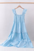 Robe bleue à volants étagés et smocks