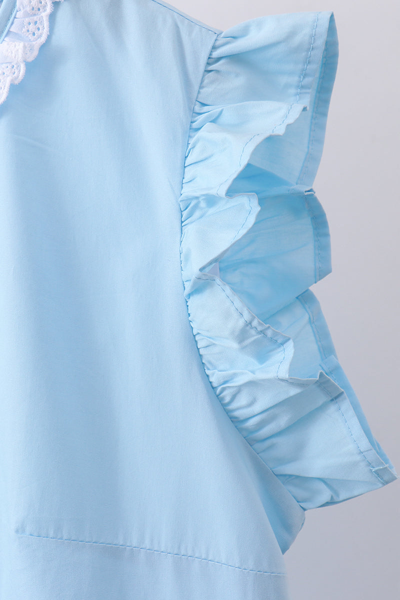Robe étagée à volants et broderies croix bleues