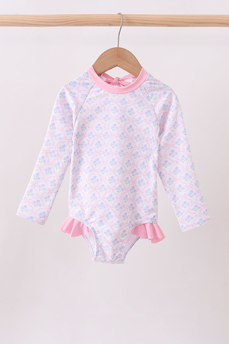 Haut anti-UV rose à volants imprimé floral