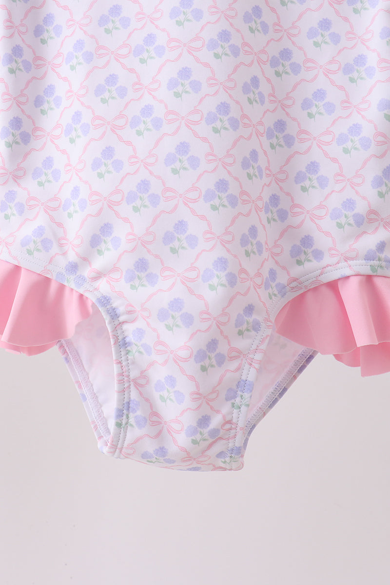 Haut anti-UV rose à volants imprimé floral