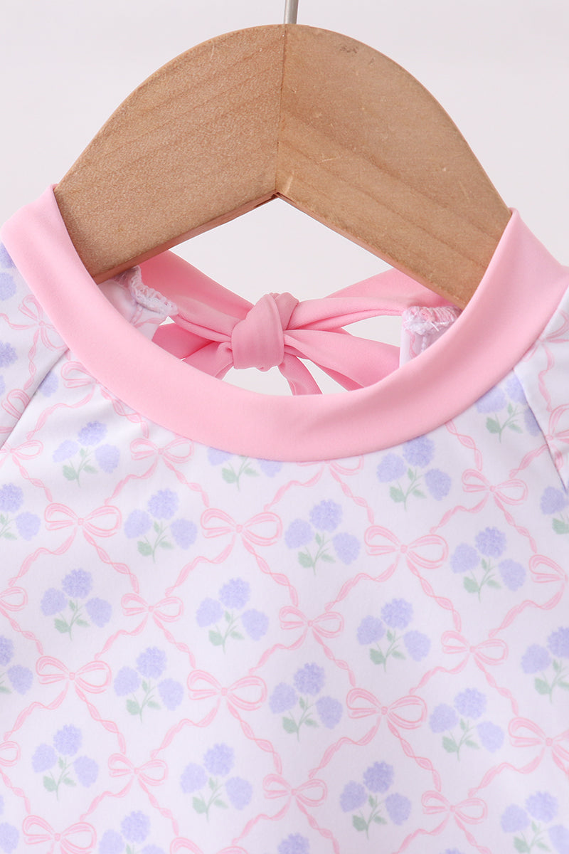 Haut anti-UV rose à volants imprimé floral